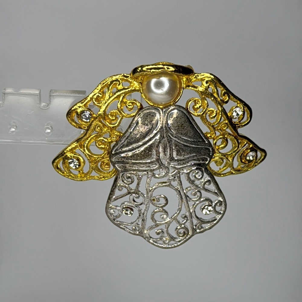 Elegant Gold and Silver Angel Brooch with Intricate Filigree